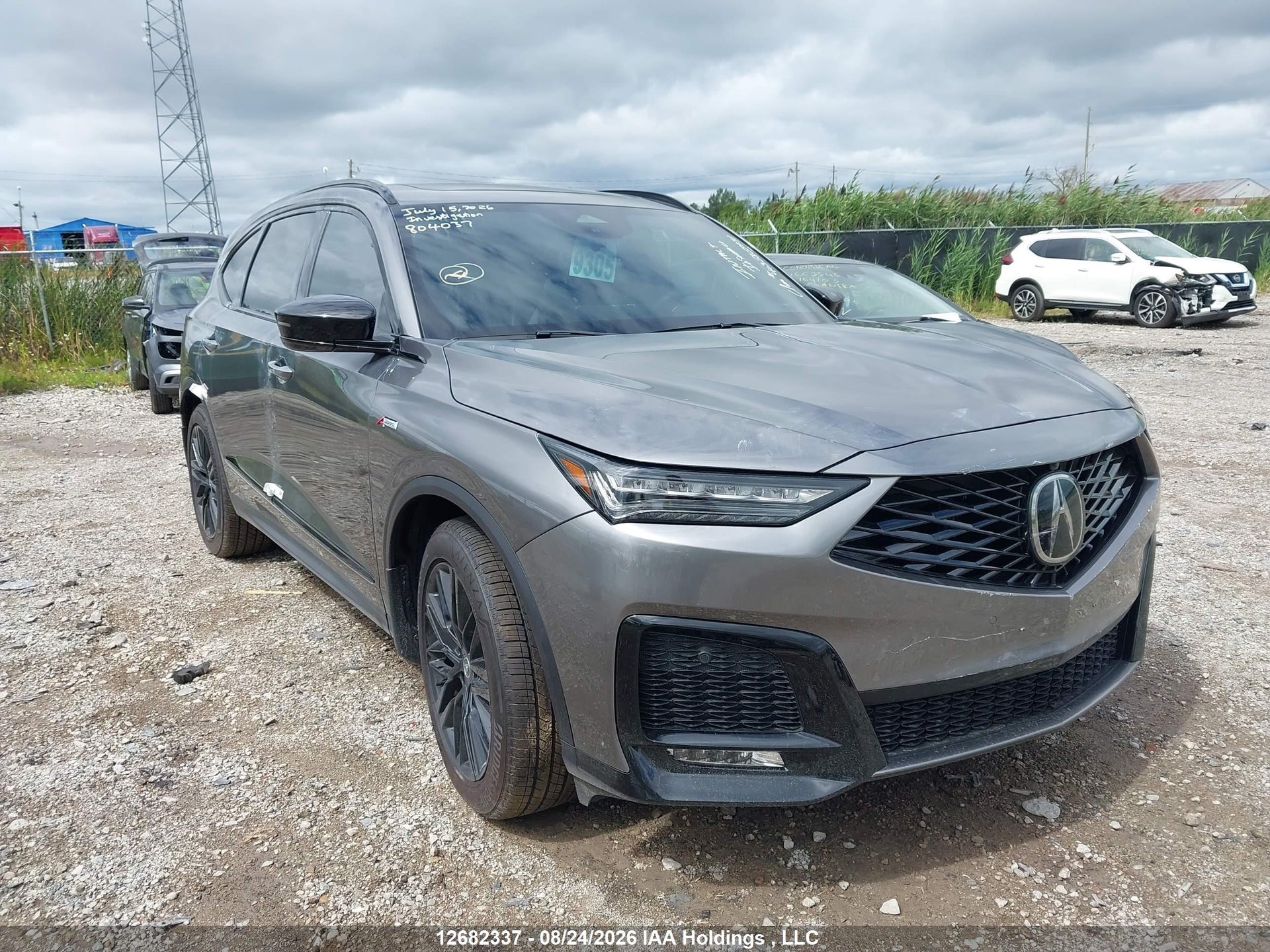 2026 ACURA MDX PLATINUM ELITE A-SPEC — VIN 5J8YE1H97TL804037 — Theft & Roof Damage damage — salvage auction photo — TrueBid 2026 ACURA MDX PLATINUM ELITE A-SPEC — VIN 5J8YE1H97TL804037 — Theft & Roof Damage damage — salvage auction photo — TrueBid
