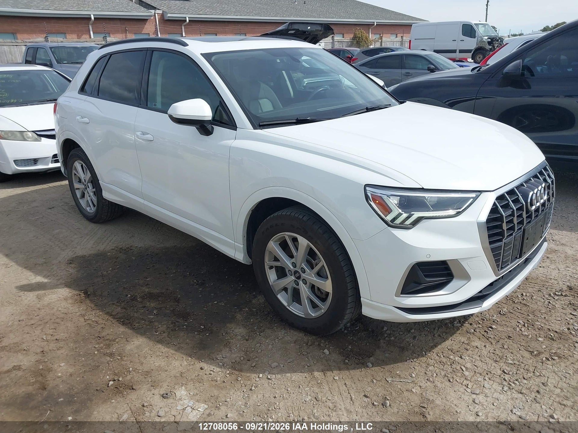 2022 AUDI Q3 45 KOMFORT/45 PROGRESSIV — VIN WA1AECF31N1014087 — Front & Hail damage — salvage auction photo — TrueBid 2022 AUDI Q3 45 KOMFORT/45 PROGRESSIV — VIN WA1AECF31N1014087 — Front & Hail damage — salvage auction photo — TrueBid